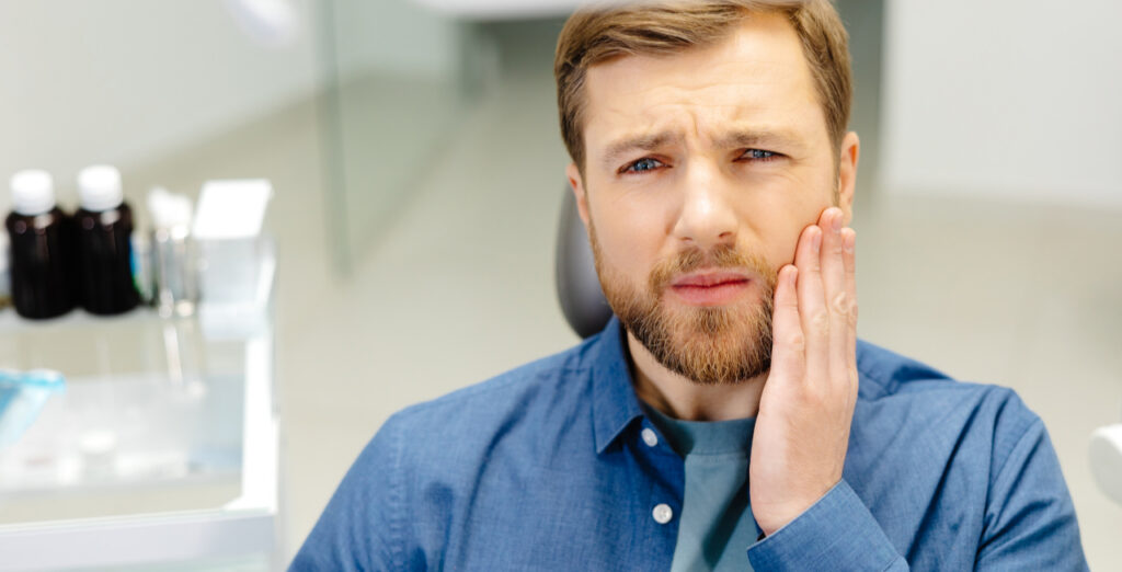 Man Suffering From Acute Dental Pain
