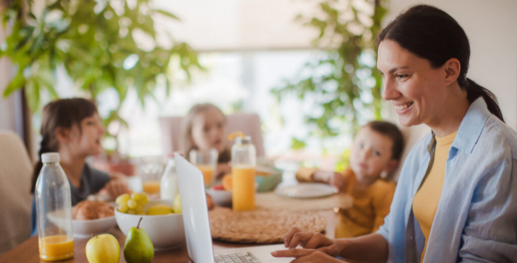 Female patient reviewing dental insurance coverage and oral surgery benefits online